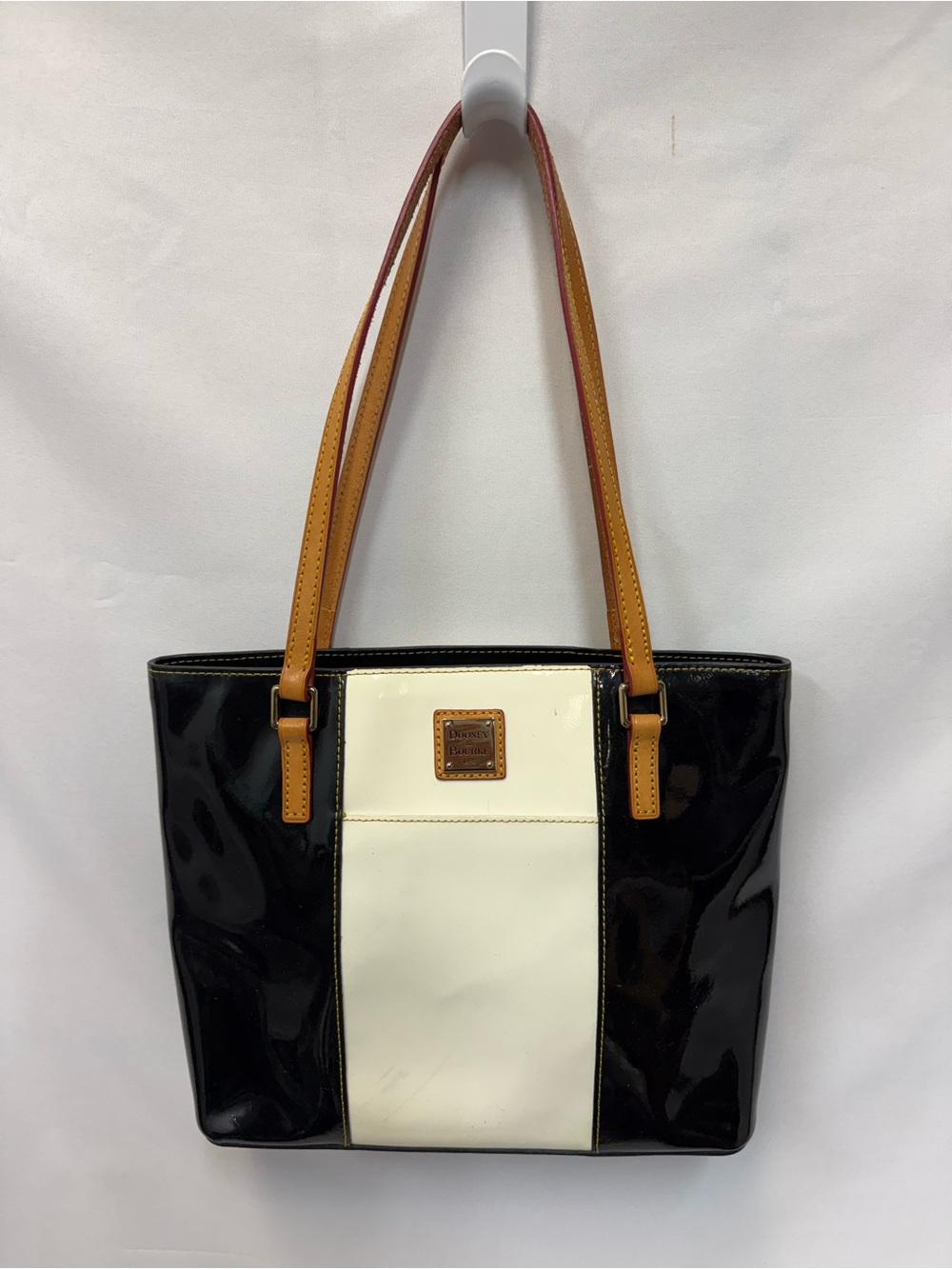 Dooney & Bourke Black and Cream Patent Leather Tote with Tan Straps